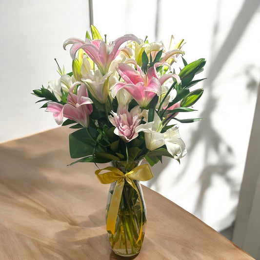 Elegant Arrangement of Pink and White Lilies - Sophistication in a Glass Vase