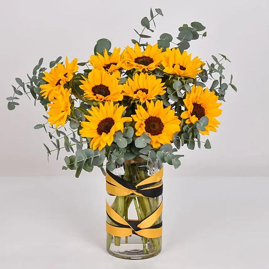Bouquet of Sunflowers in a Vase with Eucalyptus Foliage - Natural Elegance for Your Space