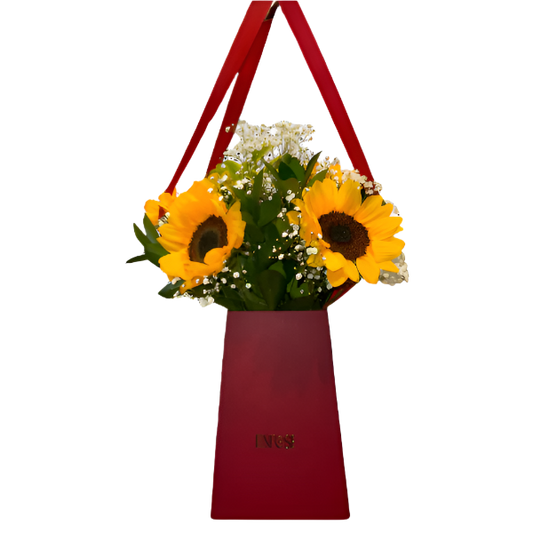 Arranjo de Girassóis em Bolsa Vermelha - Elegância Vertical