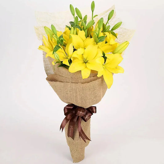 Bouquet of Yellow Lilies Wrapped in Burlap