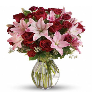 Evening of Elegance: Luxurious Floral Arrangement of Red Roses and Lilies