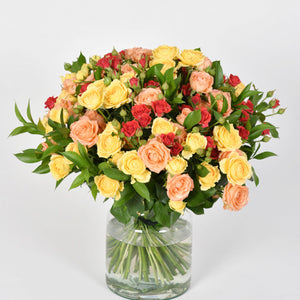 Arrangement of Mini Roses in a Glass Vase - Elegance and Soft Colors