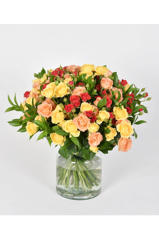 Arrangement of Mini Roses in a Glass Vase - Elegance and Soft Colors